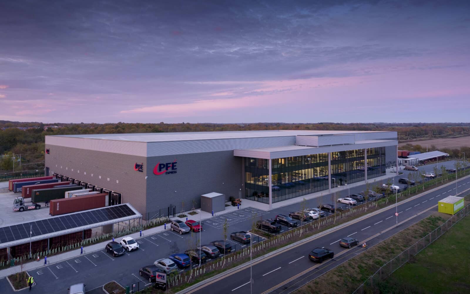 PFE Express state-of-the-art headquarters building in Witham with modern industrial design, solar panels, and associated facilities.